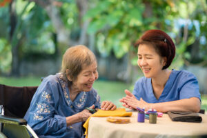 Companion care at home helps seniors stay active and engaged through activities and crafts.